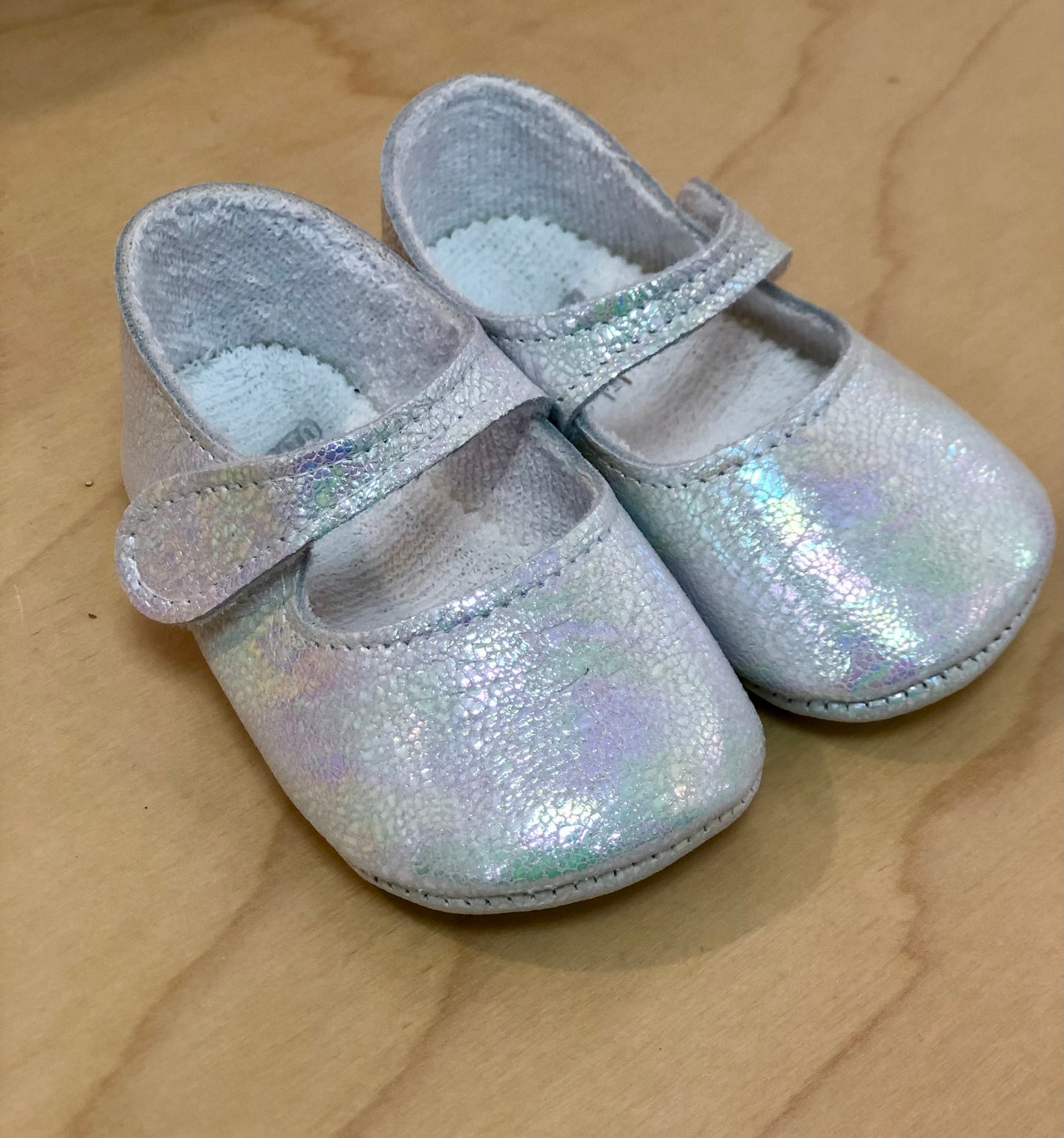 Baby girl’s soft shoes iridescent
