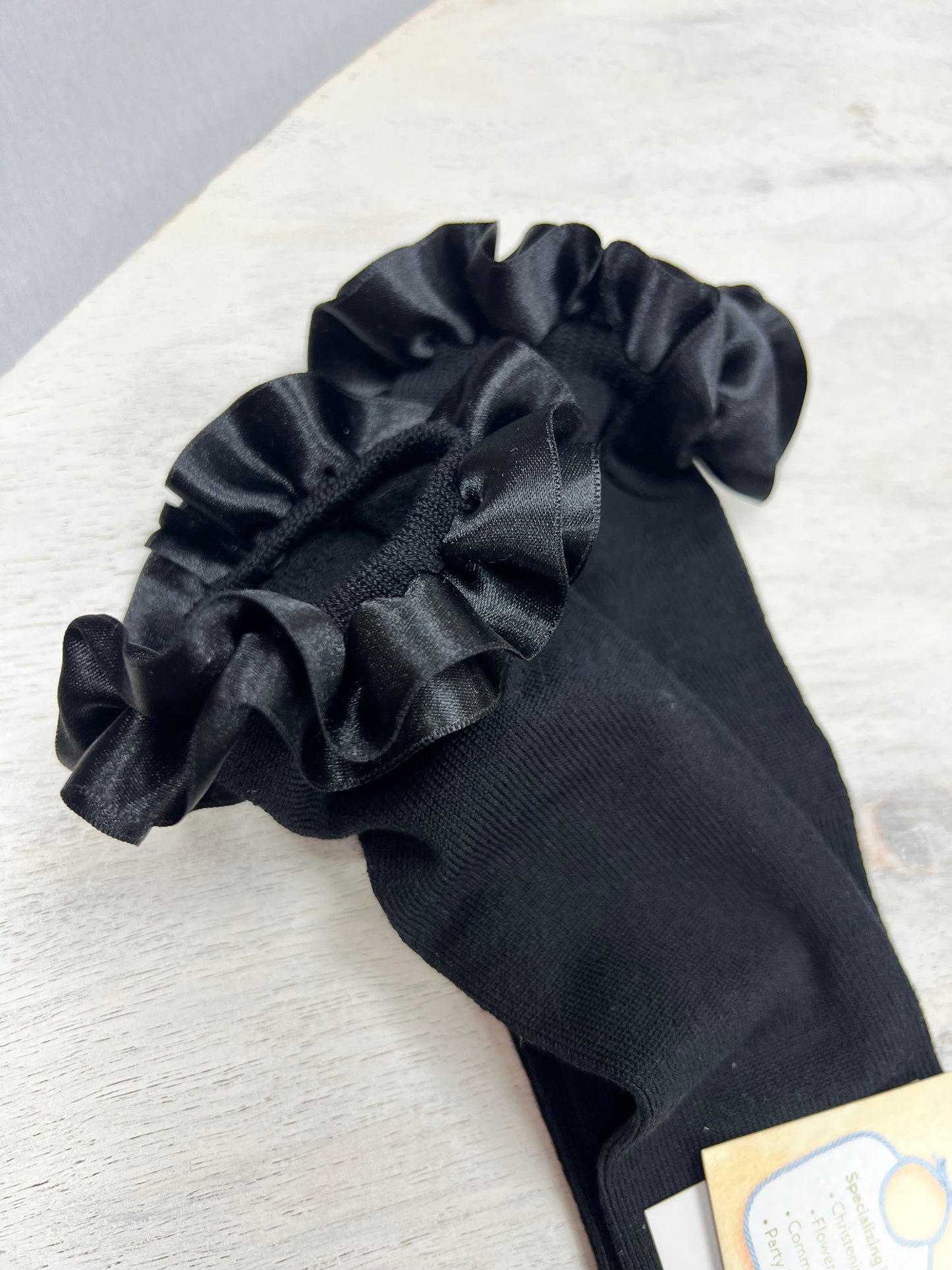 Black nee high socks with satin ruffle