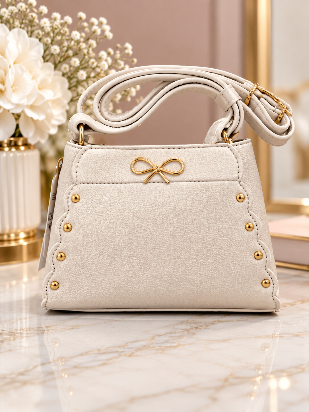 Ivory Bow Accent Studded Handbag