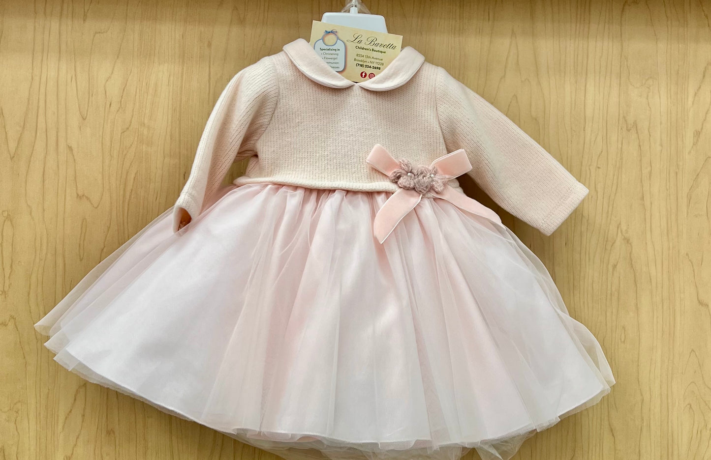 Adorable light pink baby girls dress made in Italy