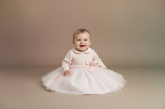 Adorable light pink baby girls dress made in Italy