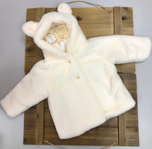 Baby’s white plush faux fur jacket