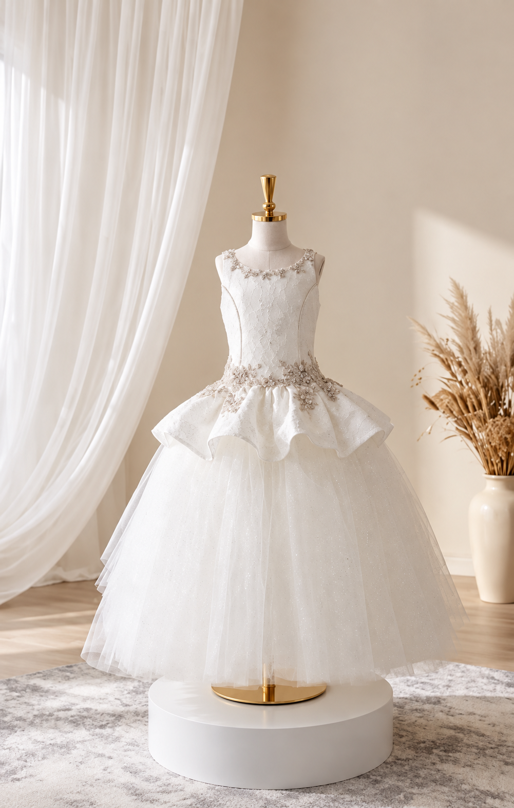 Girls white couture ball gown with crystal embellishments and layered tulle skirt, front view on mannequin
