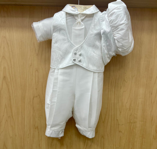 A white silk christening outfit for a baby boy, featuring a jacquard vest and tie, with back buttons and inseam for comfort. The outfit is displayed on a wooden hanger.