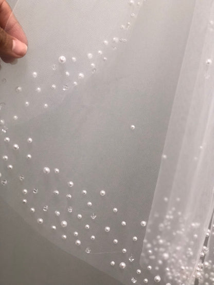 White communion veil with scattered pearl edge