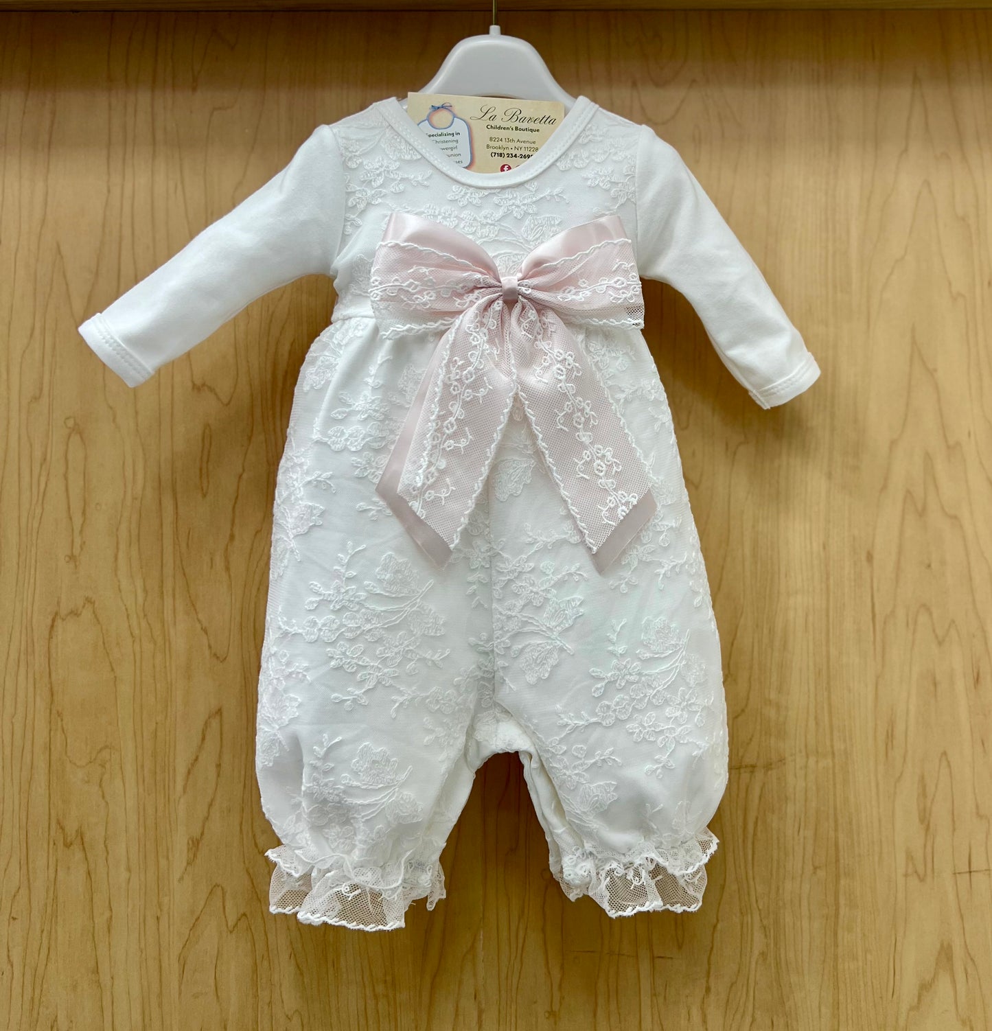 White lace romper with pink Bow