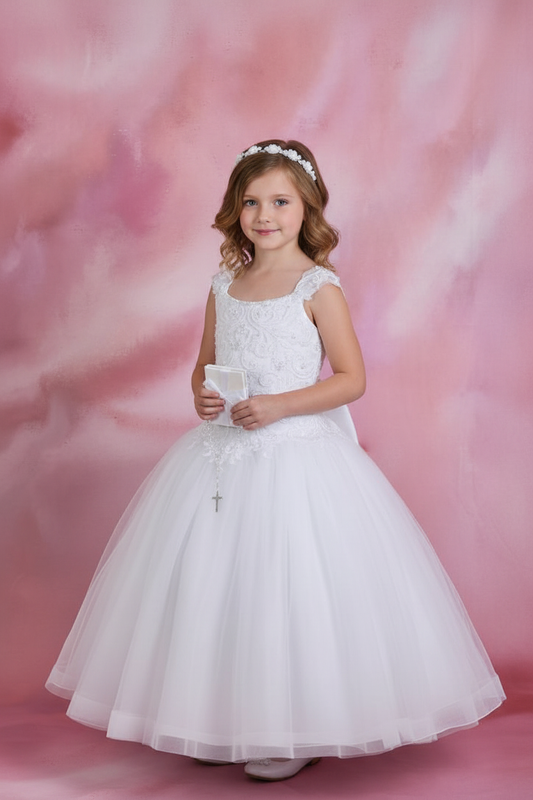 Girl wearing Christie Helene First Communion dress