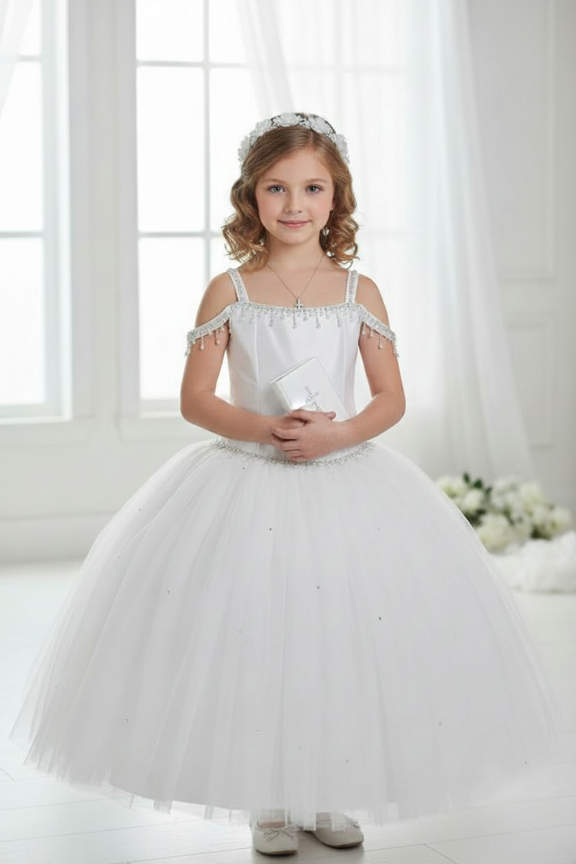 Girl wearing Margo communion dress - front view with hands at sides