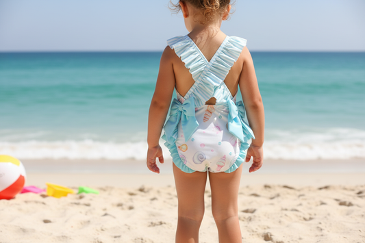 Girl wearing seaside bathing suit - back view